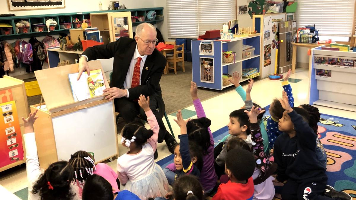 Congressman Foster reading in a school