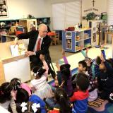 Congressman Foster reading in a school
