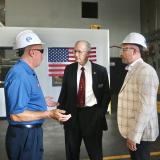 Foster visits a manufacturing facility
